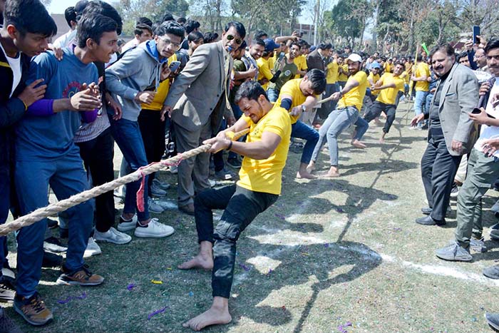 Students participating in Tug of War competition during 58th Annual Sports Festival 2024 at Government Graduate College Samanaabad.