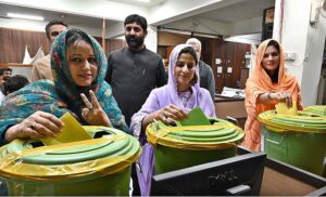 A voter cast her vote during the APP Employees Union Election- 2024 at APP Headquarters.