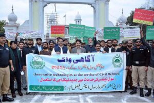 Kashif Raza Awan, Additional Deputy Commissioner is leading a rally to mark International Civil Defence Day at Zilla Council Chowk