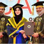 Vice Chancellor ISRA University Dr. Ahmad Waliullah kazi is giving away degrees among to the successful graduate student during 21st convocation of ISRA University