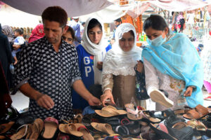 Women busy in Eid shopping at Resham Bazaar during upcoming Eid-ul- Fitr celebrations.
