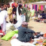 People busy shopping at Sunday market
