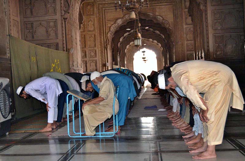 A large number of faithful offering Namaz-e-Jumma during Holy Fasting Month of Ramzanul Mubarak at Badshahi Mosque.