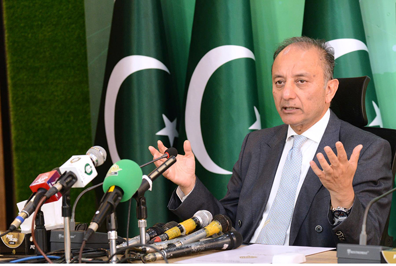 Minister for Power and Petroleum, Dr Musadiq Malik talks to media personnel.