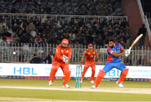 Karachi Kings batter, Kieron Pollard plays shot during the Pakistan Super League (PSL) Twenty20 cricket match at the Rawalpindi Cricket Stadium.