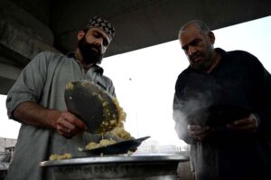 GDA arranges free Dastarkhwan for deserving people to break their fast at Gulbahar Chowk.