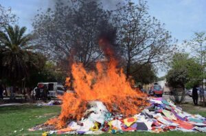 City Police Officer (CPO) Captain (Retired) Muhammad Ali Zia is monitoring the process of burning kites and string at Police Lines, during anti-kite-flying drive in the city.