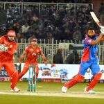 Karachi Kings batter, Kieron Pollard plays shot during the Pakistan Super League (PSL) Twenty20 cricket match at the Rawalpindi Cricket Stadium.