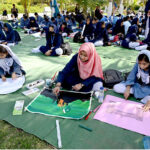 Student participating in Intra –School Arts Competition to celebrate Pakistan Day at Quaid –i-Azam Mazar organized by Government of Pakistan Ministry of Information and Broadcasting Directorate of Electronic Media and Publications (DEMP) Regional Office and Quaid –i-Azam Mazar Management Board (QMMB), National Heritage and Culture Division