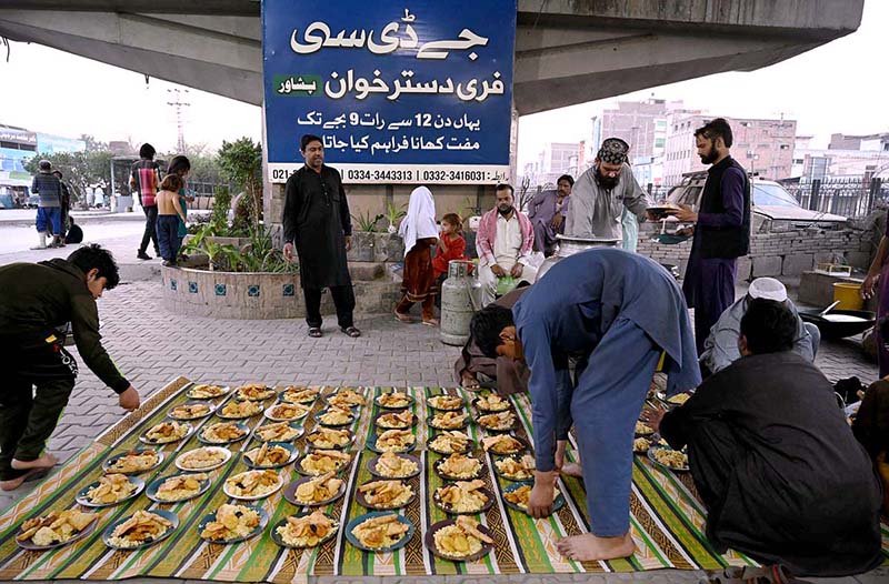 GDA arranges free Dastarkhwan for deserving people to break their fast at Gulbahar Chowk.