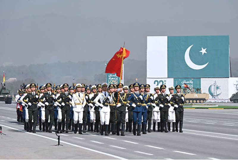 A contingent of People’s Liberation Army participate in Pakistan Day 2024 parade march past ceremony, at Shakarparian Parade Ground