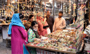 Women busy in shopping for upcoming Eid ulFitr festival.