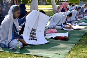 Student participating in Intra –School Arts Competition to celebrate Pakistan Day at Quaid –i-Azam Mazar organized by Government of Pakistan Ministry of Information and Broadcasting Directorate of Electronic Media and Publications (DEMP) Regional Office and Quaid –i-Azam Mazar Management Board (QMMB), National Heritage and Culture Division