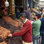 Vendors are busy in arranging and displaying different kinds of dates for selling on the arrival of Holy Month Ramadan