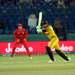 Peshawar Zalmi's batter Babar Azam plays a shot during the Pakistan Super League (PSL 9) Twenty20 cricket elimination match between Islamabad United and Peshawar Zalmi at the National Stadium