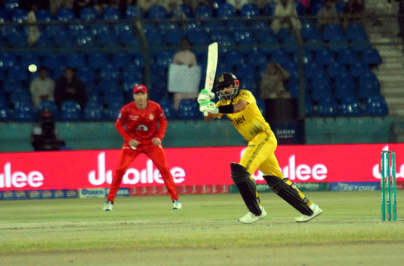 Peshawar Zalmi's batter Babar Azam plays a shot during the Pakistan Super League (PSL 9) Twenty20 cricket elimination match between Islamabad United and Peshawar Zalmi at the National Stadium