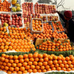 A vendor displaying fruits to attract the customers at his setup in the Provincial Capital