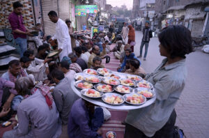 A large number of people breaking fast (Iftar) during the holy month of Ramazan ul Mubarak.