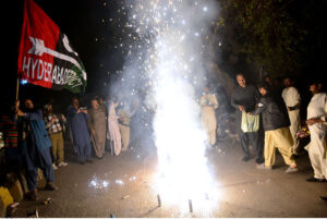 Workers of People's Party celebrating on the victory of President-elect Asif Ali Zardai outside Press Club