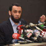 Federal Minister for Information and Broadcasting, Attaullah Tarar addressing a press conference at 180 h Model Town
