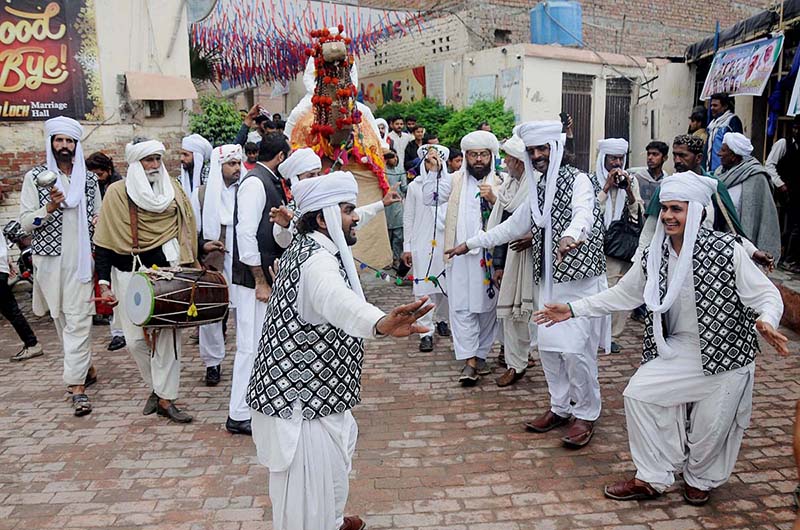 Artists performing traditional dance during a function to mark Baloch Culture Day