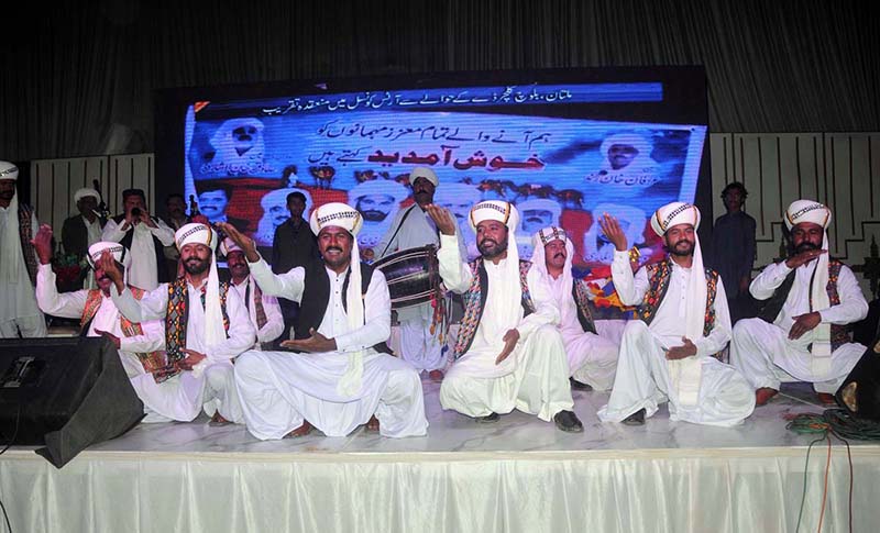 Artists performing traditional dance during a function to mark Baloch Culture Day