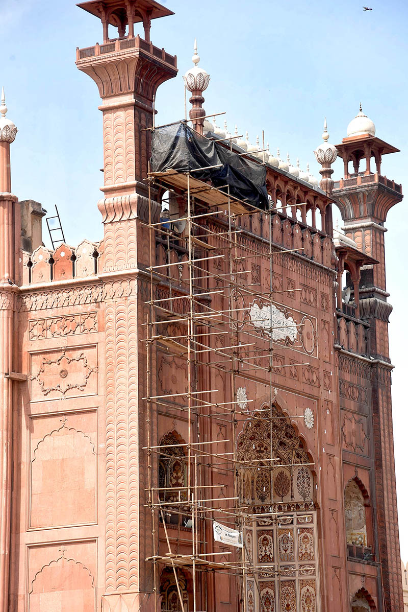 Construction work is going on the Alamgiri gate of Badshahi Masjid.