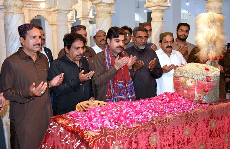 Sindh Minister for Energy, Planning and Development Syed Nasir Hussain Shah offering Fateha on the grave of Shaheed Zulfqar Ali Bhutto at Garhi Khuda Bakhsh