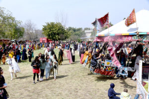 Students enjoy camel ride during Annual Funfair at Model College G10/4.