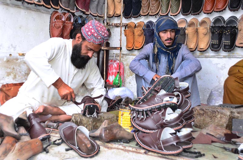 Workers making handmade traditional Balochi Chappli ahead of Eid-ul-Fitr