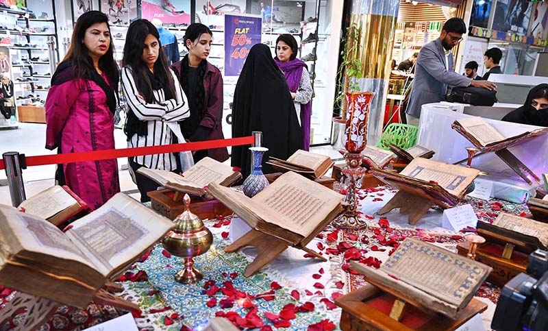 Chairman of the Council of Islamic Ideology (CII) Dr. Qibla Ayaz along with others cutting ribbon at the opening ceremony of Quran Exhibition of Manuscripts organized by Cultural Consulate Embassy of I.R.Iran Islamabad and Iran Pakistan Institute of Persian Studies in collaboration with Safa Gold Mall