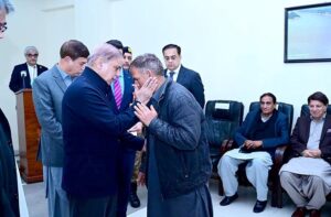Prime Minister Muhammad Shehbaz Sharif distributing assistance cheques among the families of the deceased and injured in the wake of recent torrential rains and heavy snowfall.
