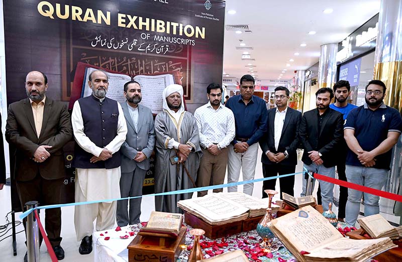 Chairman of the Council of Islamic Ideology (CII) Dr. Qibla Ayaz along with others cutting ribbon at the opening ceremony of Quran Exhibition of Manuscripts organized by Cultural Consulate Embassy of I.R.Iran Islamabad and Iran Pakistan Institute of Persian Studies in collaboration with Safa Gold Mall