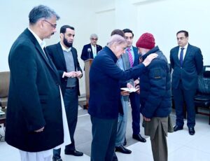 Prime Minister Muhammad Shehbaz Sharif distributing assistance cheques among the families of the deceased and injured in the wake of recent torrential rains and heavy snowfall.
