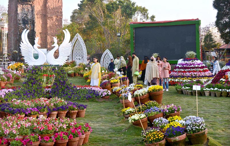 A large number of families stroll through the colorful flowers during the various flower on display organized by the PHA at Jilani Park