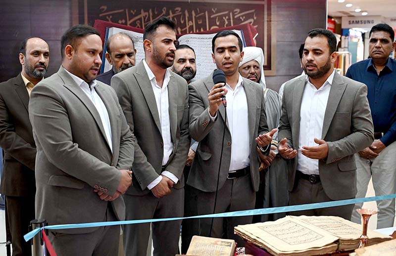 Chairman of the Council of Islamic Ideology (CII) Dr. Qibla Ayaz along with others cutting ribbon at the opening ceremony of Quran Exhibition of Manuscripts organized by Cultural Consulate Embassy of I.R.Iran Islamabad and Iran Pakistan Institute of Persian Studies in collaboration with Safa Gold Mall