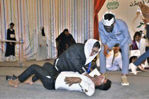 Artists performing on the stage during a drama titled "Murad Kya Hai" by Azhar Lakha during the 1st Punjab Theater Competition 2024 in collaboration with Punjab Arts Council