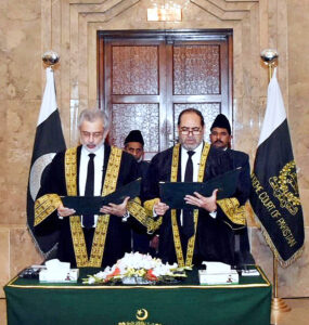 The Honourable Chief Justice of Pakistan Mr. Justice Qazi Faez Isa administering the oath of office to Honourable Mr. Justice Naeem Akhtar Afghan, Chief Justice, High Court of Balochistan as Judge of the Supreme court of Pakistan at the Supreme Court