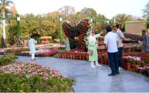 A large number of families stroll through the colorful flowers during the various flower on display organized by the PHA at Jilani Park
