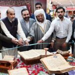 Chairman of the Council of Islamic Ideology (CII) Dr. Qibla Ayaz along with others cutting ribbon at the opening ceremony of Quran Exhibition of Manuscripts organized by Cultural Consulate Embassy of I.R.Iran Islamabad and Iran Pakistan Institute of Persian Studies in collaboration with Safa Gold Mall