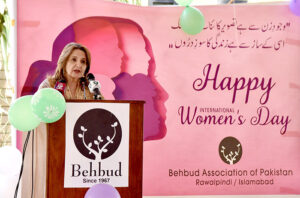 First Lady Begum Samina Alvi addressing an event in connection with International Women's Day, at Behbud Association of Pakistan.