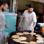 A worker preparing vermicelli at his workplace mostly used in holy Ramadan