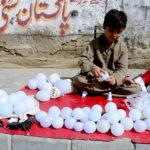A teenager boy repairing LED bulbs at Joint Road to earn for livelihood