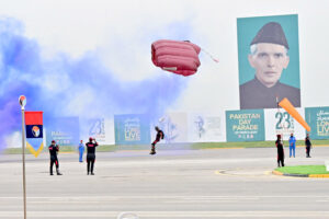 Pakistan Army paratroopers showing their skills, participate in Pakistan Day 2024 parade ceremony, at Shakarparian Parade Ground