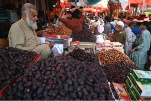 People purchasing dates ahead of holy month of Ramazan at Khajoor Bazaar