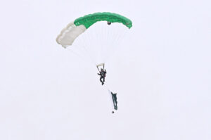 Pakistan Army paratroopers demonstrate their skills during free dive participating in Pakistan Day 2024 parade ceremony, at Shakarparian Parade Ground