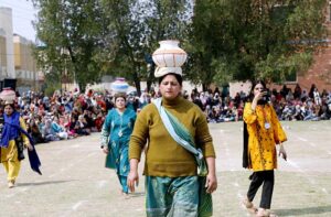 Students participating in different competitions during 8th Annual Sports Day 2024 organized by Government College Women University Faisalabad(GCWUF).