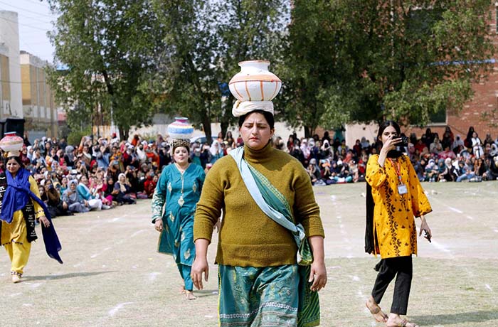 Students participating in different competitions during 8th Annual Sports Day 2024 organized by Government College Women University Faisalabad(GCWUF).