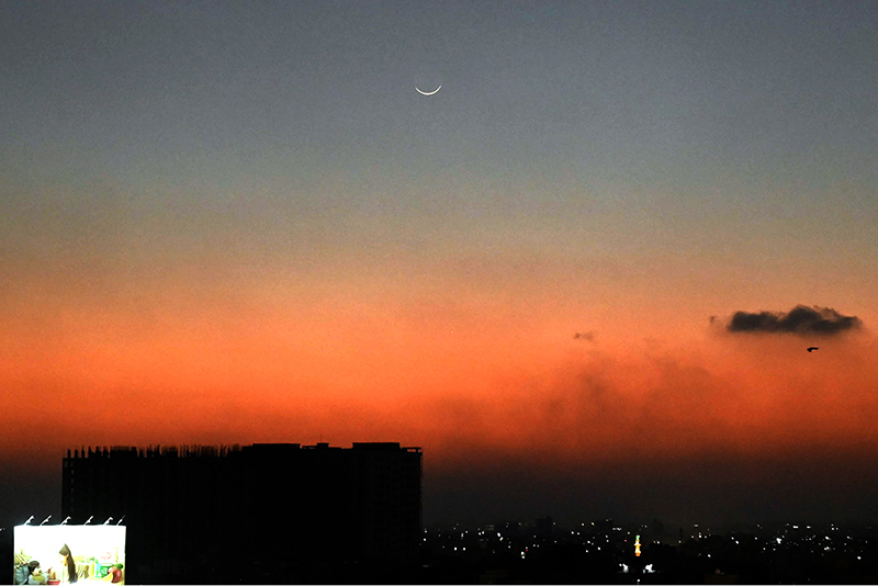 An eye-catching view of the first crescent moon of Ramzan ul Mubarak sighting on the horizon