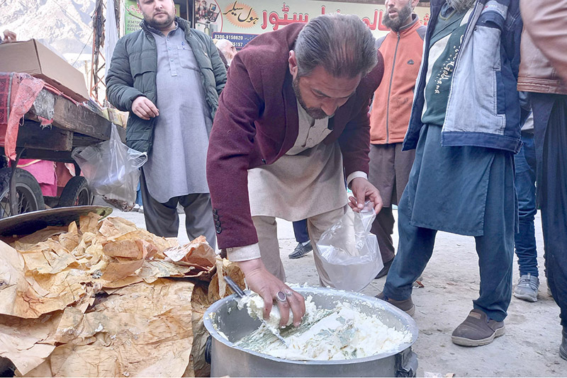 A vendor selling pure butter stored in bark shell on the road side during the 1st day of holy Month of Ramazan